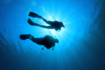Couple Scuba Diving together